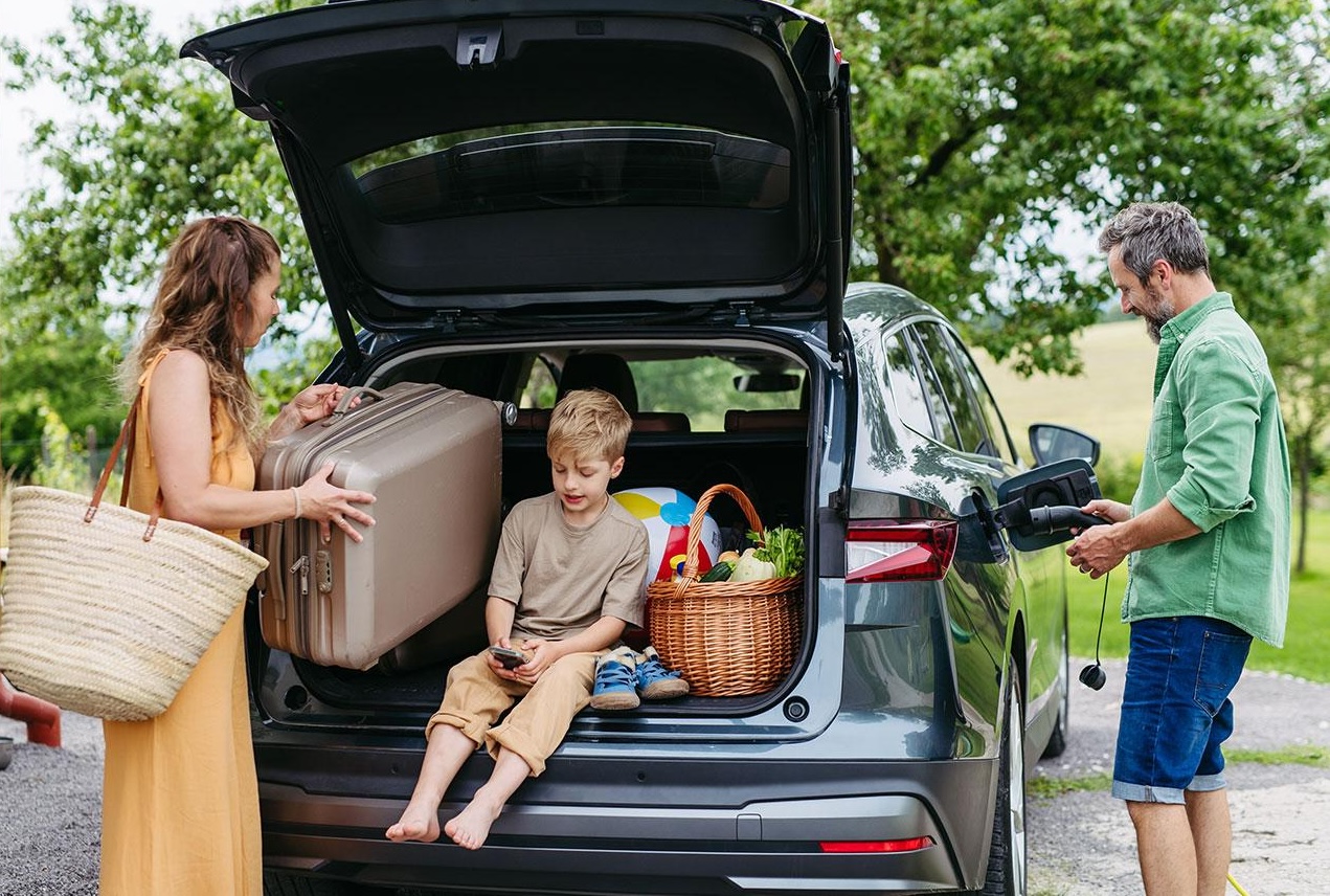 Happy family with car insurance protection